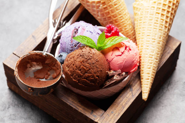 istock Berry, vanilla and chocolate ice cream sundae 1302609432