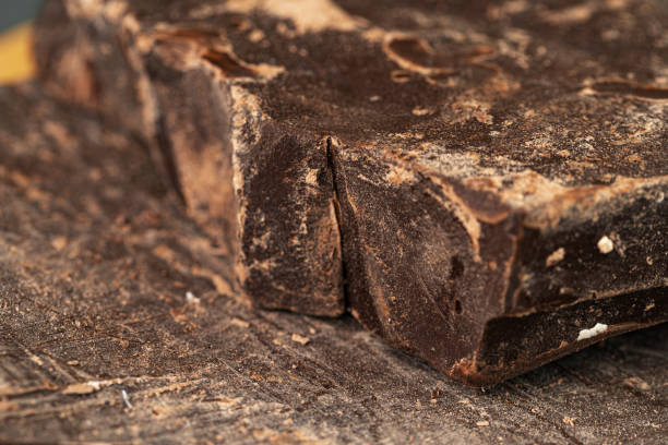 istock Pieces of natural dark chocolate close up 1302609749