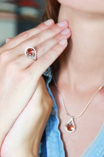 istock Women's jewelry ring and pendant with a precious stone 1302612575