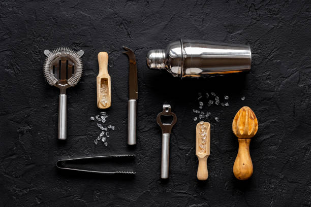 istock Set of bartender tools and accessories with a cocktail shaker 1302617445