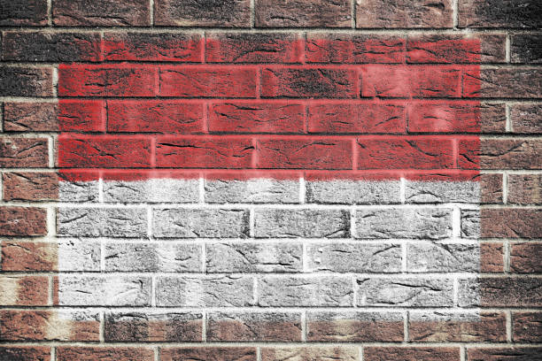 istock Indonesia flag painted on brick wall background 1302620274