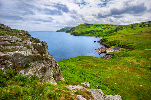 View from Torr Head on the Causeway Coastal route and on small harbour and salmon fishery of Portaleen, Ballycastle, County Antrim, Northern Ireland, United Kingdom