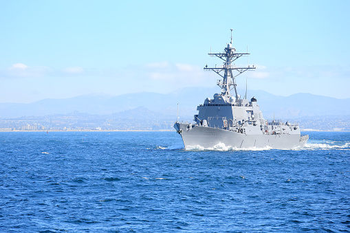 U.S. military ship is leaving the port of San Diego, California