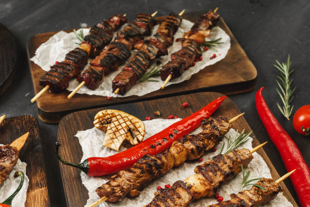 istock Grilled meat skewers barbecue served on board 1302622107