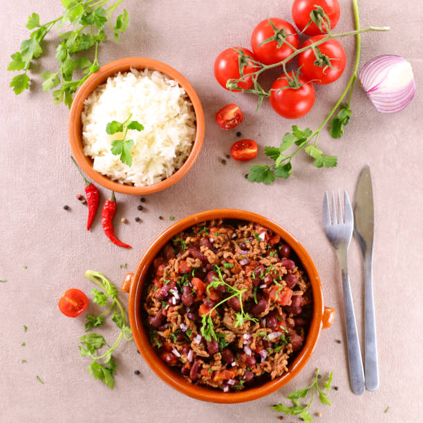istock chili con carne and rice - top view 1302623834