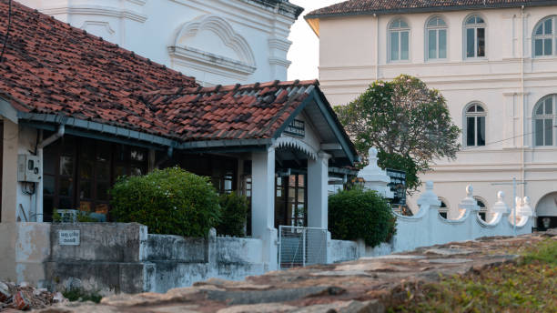 istock Galle fort library front entrance t view from behind the forts elevated grass pathway, 1302625795