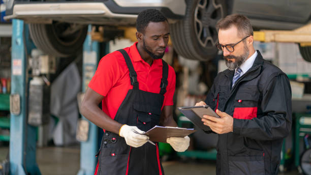 istock The mechanic discussion at the garage 1302627488