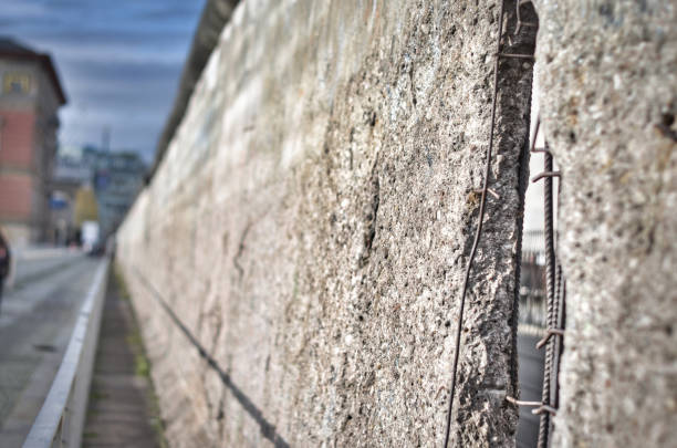 istock remnants of the berlin wall with a gap 1302628621