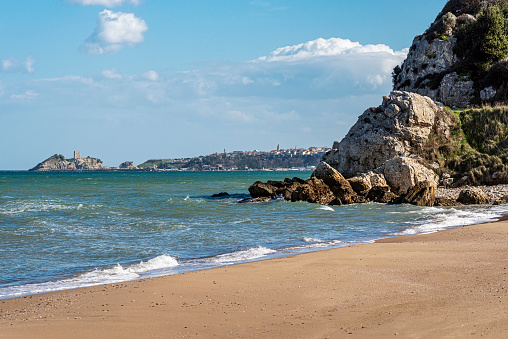 Beach and rocky coast view. The town of Sile in Istanbul is seen in the background.
