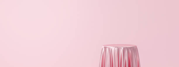 istock Pink product background stand or podium pedestal on empty display with luxury fabric backdrops. 3D rendering. 1302631317