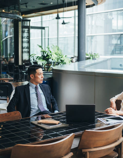 istock Business man at meeting 1302637750