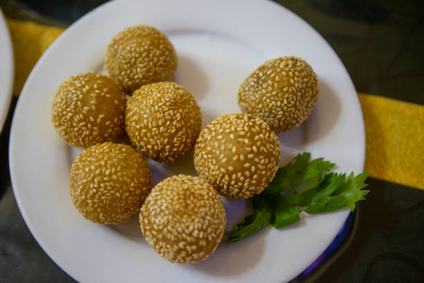 Falafels, gently spiced blend of sweet potato, chickpeas and onion with a sour dip, middle eastern food