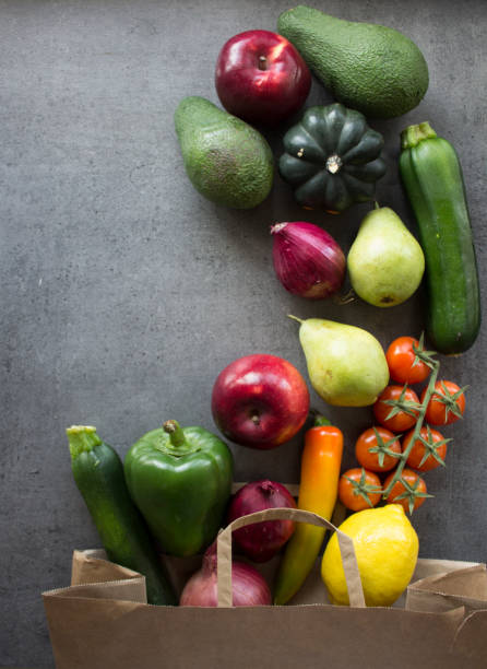 istock Vegetables and fruits in paper bag. Zero waste concept. 1302640046