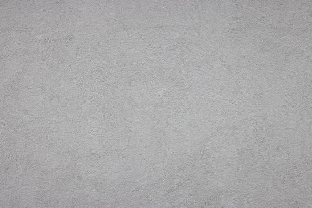 кремовый бетонный фон стены - textured textured effect stone plaster стоковые фото и изображения