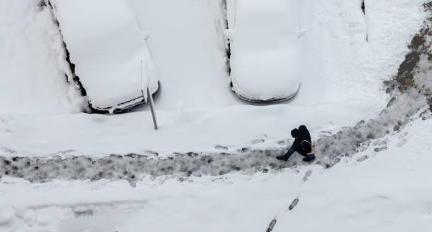 istock Footprints in the snow field 1302643054