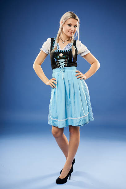 istock German girl on blue background 1302646272