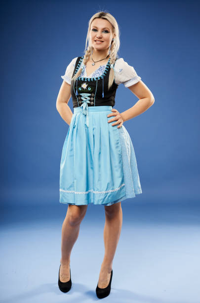 istock German girl on blue background 1302646279