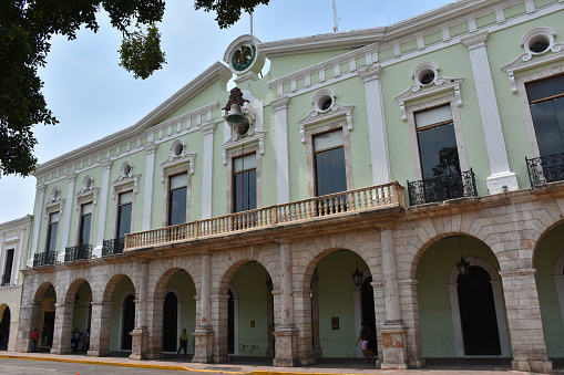 Mérida, Mexico - May 15, 2019: The Palacio de Gobierno (Government Palace), which houses the executive government offices of the state of Yucatán, on the north side of Plaza Grande.