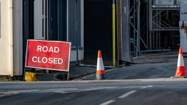 istock A road closed sign on a street 1302647620
