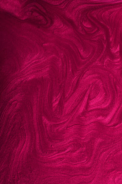istock Vertical shimmer magenta abstract background.Gorgeous monochrome color. Make up concept.Beautiful stains of liquid nail laquers.Fluid art,pour painting technique.Good for placing text or logo. 1302649041
