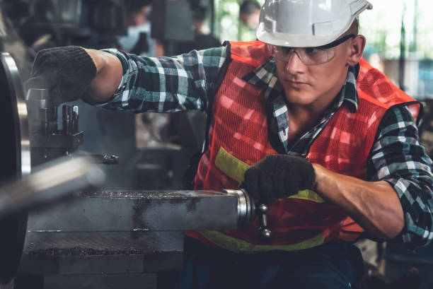 istock Smart factory worker or engineer do machine job in a manufacturing workshop 1302650368