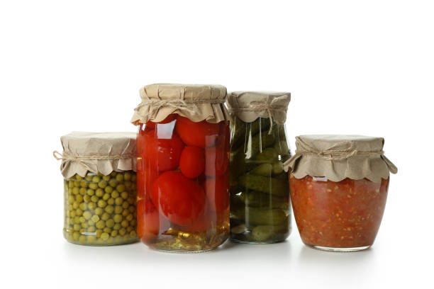 istock Jars with different canned food isolated on white background 1302652567