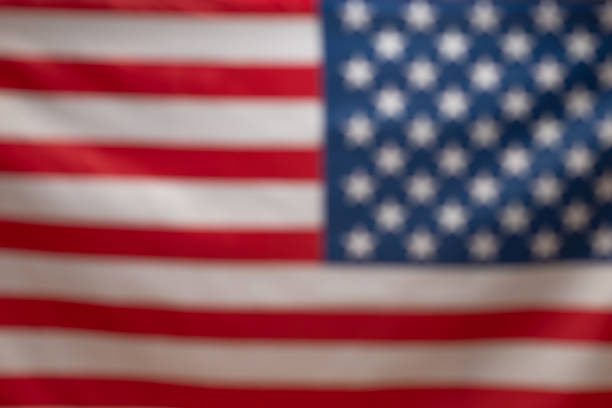 istock American flag as a background. Blurred background. 1302652735