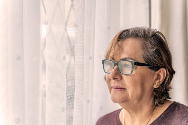 istock Senior Hispanic woman headshot 1302653006