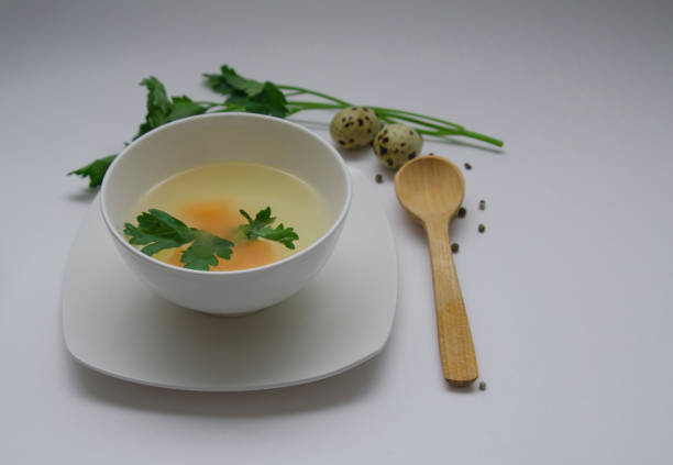 istock Diet chicken broth in a white bowl 1302654299