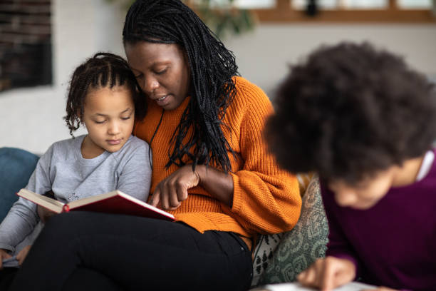 istock Mother homeschooling her daughter 1302654746