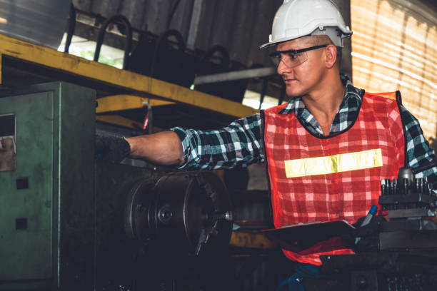 istock Smart factory worker or engineer do machine job in a manufacturing workshop 1302655590