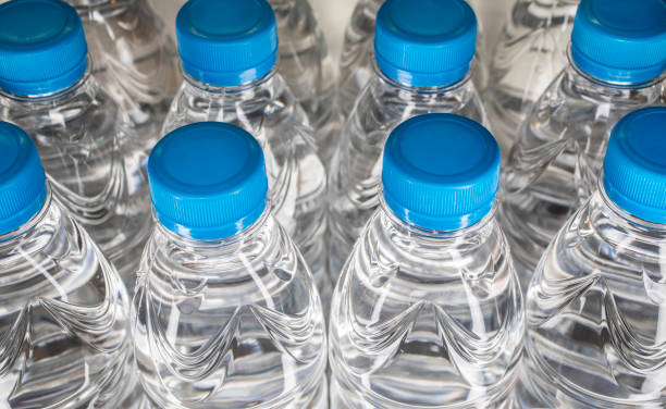 Water bottles closeup Closeup of PET water bottles polyethylene terephthalate stock pictures, royalty-free photos & images