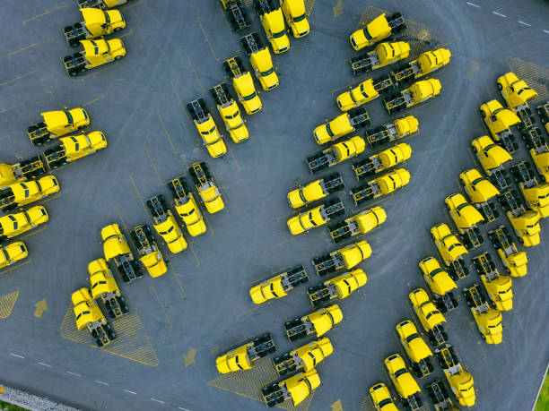 istock Overhead view of semi trucks parked 1302656834