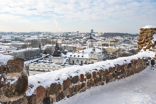 Aerial view of Vilnius old town, capital of Lithuania in winter day with roof covered by the snow