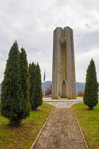 Mirna, Slovenia - December 29th 2018. A Yugoslavia era communist second world war memorial in Mirna known as the Monument to the Fallen on Roja Hill. It is dedicated 106 resistance fighters from the region who died during the war