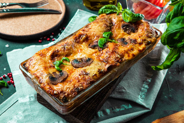 istock Baked vegetarian lasagna with mushrooms and basil 1302662310