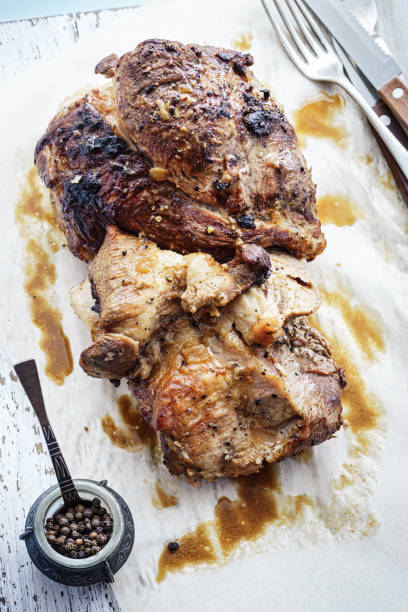 istock Juicy baked pork shoulder above 1302665454