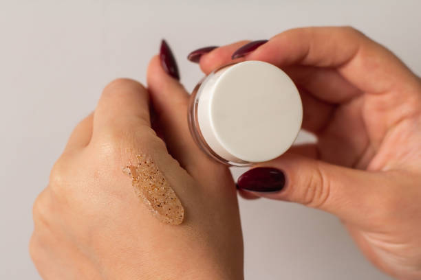 istock Scrub texture made of natural ingredients on the hand 1302666179