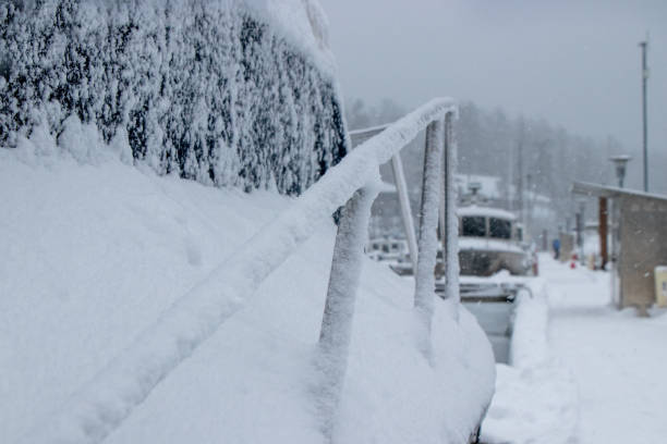 istock snow covered boats in marina 1302666491