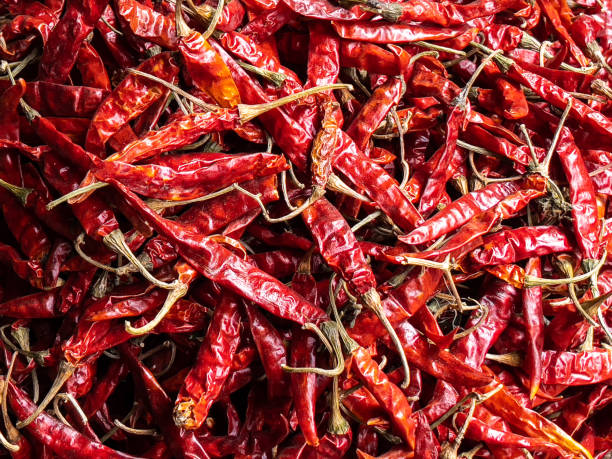 istock Dry Red Chili Peppers Background Stock image 1302667806