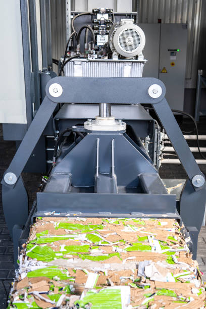 paper recycling truck and forklift loading old papers paper recycling truck and forklift loading old papers reuse manufacturing sourcing stock pictures, royalty-free photos & images