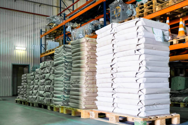 istock Big warehouse with paper rolls and printing material 1302669139