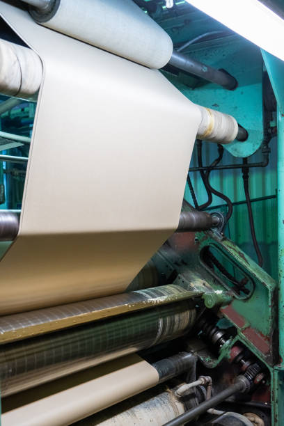 istock Printing at high speed on offset machine. Label, Rolled Up, Printing Out, Group of Objects, Merchandise 1302669306
