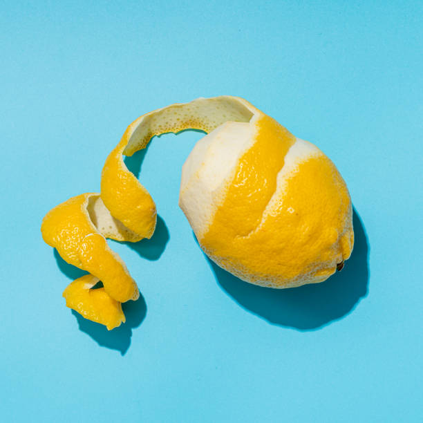 istock Lemon and spiral peel on blue background hardlight 1302669335