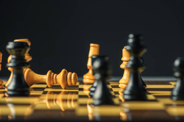 istock Horses face to face in chess. Chess concept 1302670426