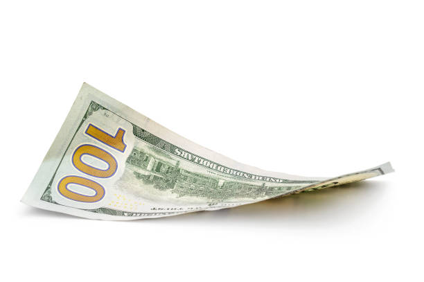 istock Curved one hundred dollar bill on white background. 1302671479