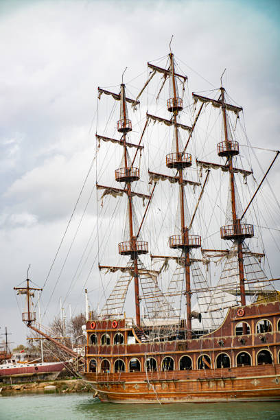 istock old pirate ship in port 1302673022