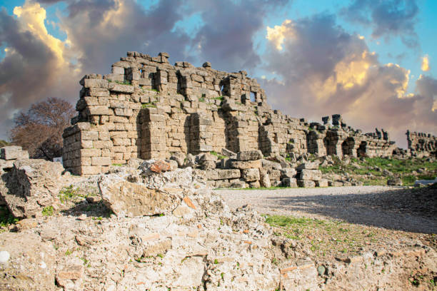 istock Old ruins in Side, Turkey - archaeology background 1302673295