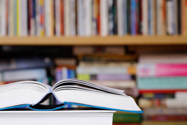 istock Open book close up at the library 1302676658