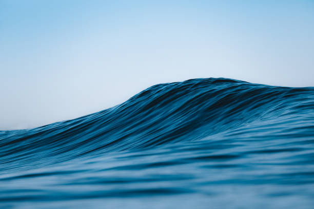 istock Close-up of a blue wave on a summer day 1302676680